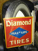 $OLD Diamond Tires "Full of Life" Diecut Tin DST Flange Sign
